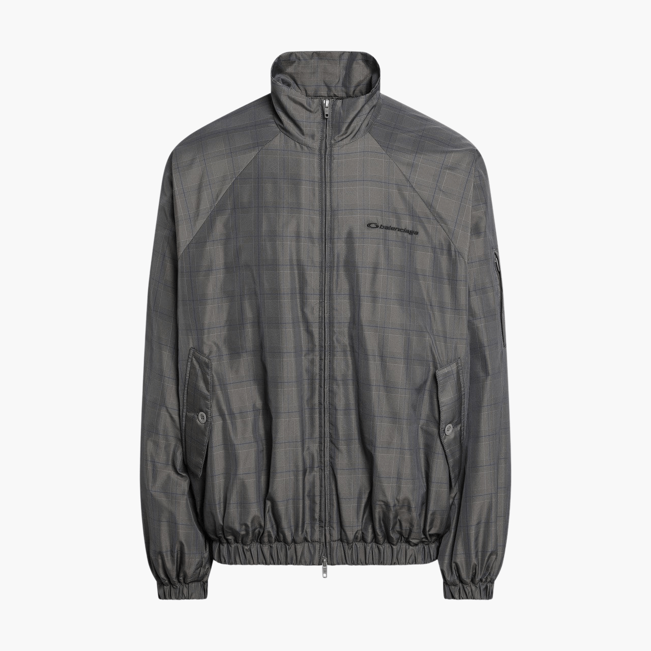 Veste Balenciaga Prince of Wales nylon présentée à plat de face, design élégant et zip central, photo produit Lesthete Concept Store.