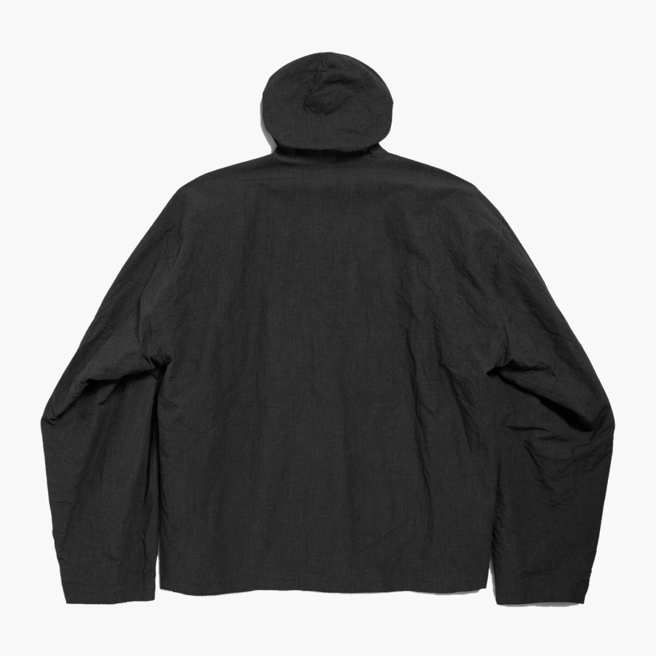 Vue arrière de la veste à capuche Balenciaga noire à plat, logo discret au dos, photo produit Lesthete Concept Store.
